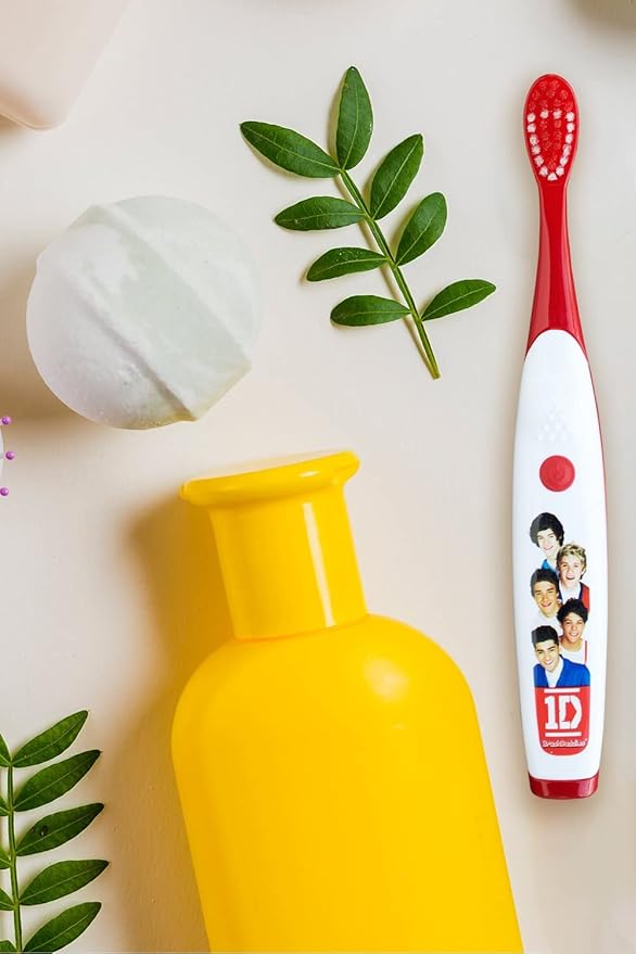 B. Designs One Direction Singing Battery Powered Tooth Brush (Live While we’re Young)/Limited Edition