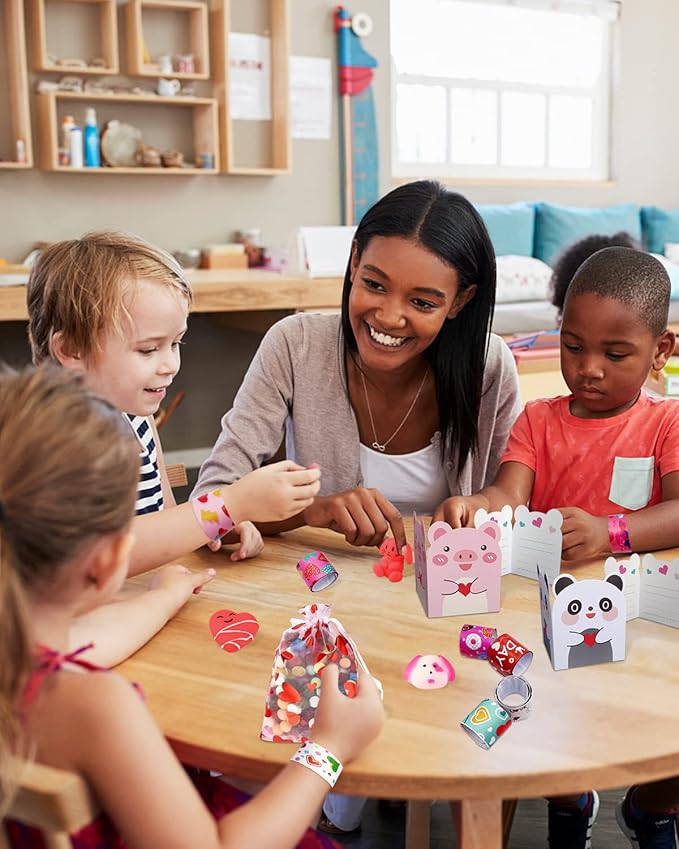 FEBALHS Party Favors for Kids, 48pcs Animal Valentines Exchange Gifts for Classroom School with Valentines Day Cards Goodie Bags Slap Bracelets Squishy Toys