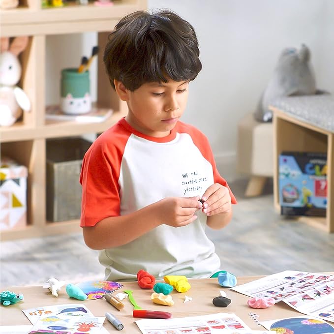 Arteza Kids Air Dry Clay, 42 Bars, Sea Life Stage Modeling Clay Kit, 14 Mini-Stages, 18 Googly Eyes, 3 Glitter Glues, 1 Craft Tool, 7 Instruction Sheets, Craft Supplies for Learning and Developing
