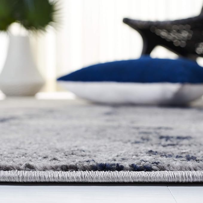SAFAVIEH Adirondack Collection Accent Rug - 2'6" x 4', Navy & Grey, Modern Abstract Design, Non-Shedding & Easy Care, Ideal for High Traffic Areas in Entryway, Living Room, Bedroom (ADR134N)