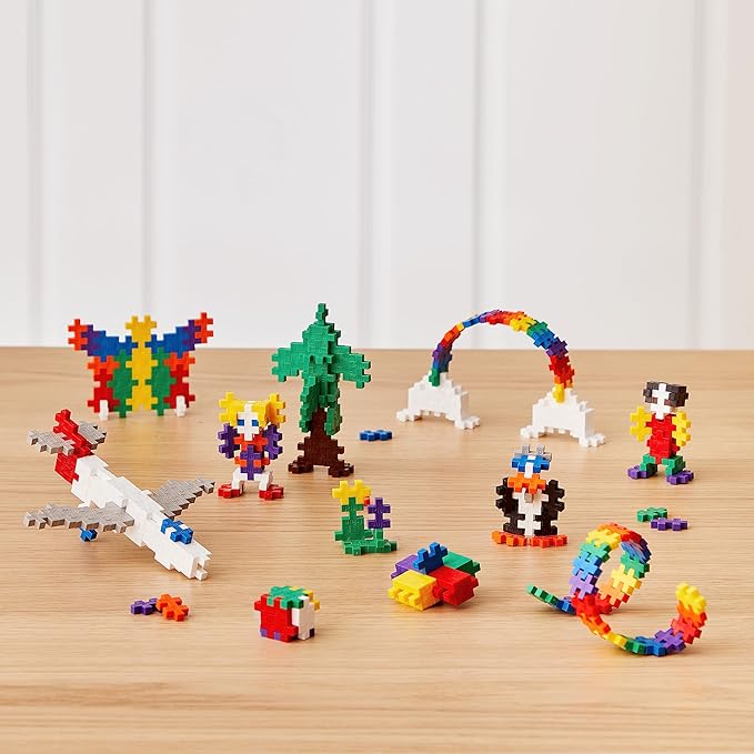 PLUS PLUS Building Set with Metal Suitcase, 3D Open Ended Stem Toy for Kids, 600 Mini Interlocking Pieces, 2 Green Baseplates