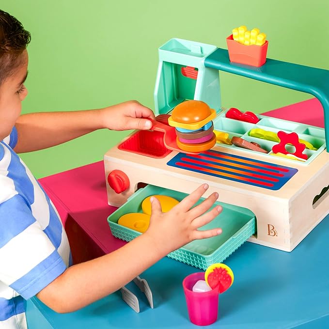 B. toys- Mini Chef - Build-a-Burger Playset- Pretend Play Wooden Burger Play Set – Play Food & Role-Play Accessories – Cooking Toys for Kids- 3 Years +